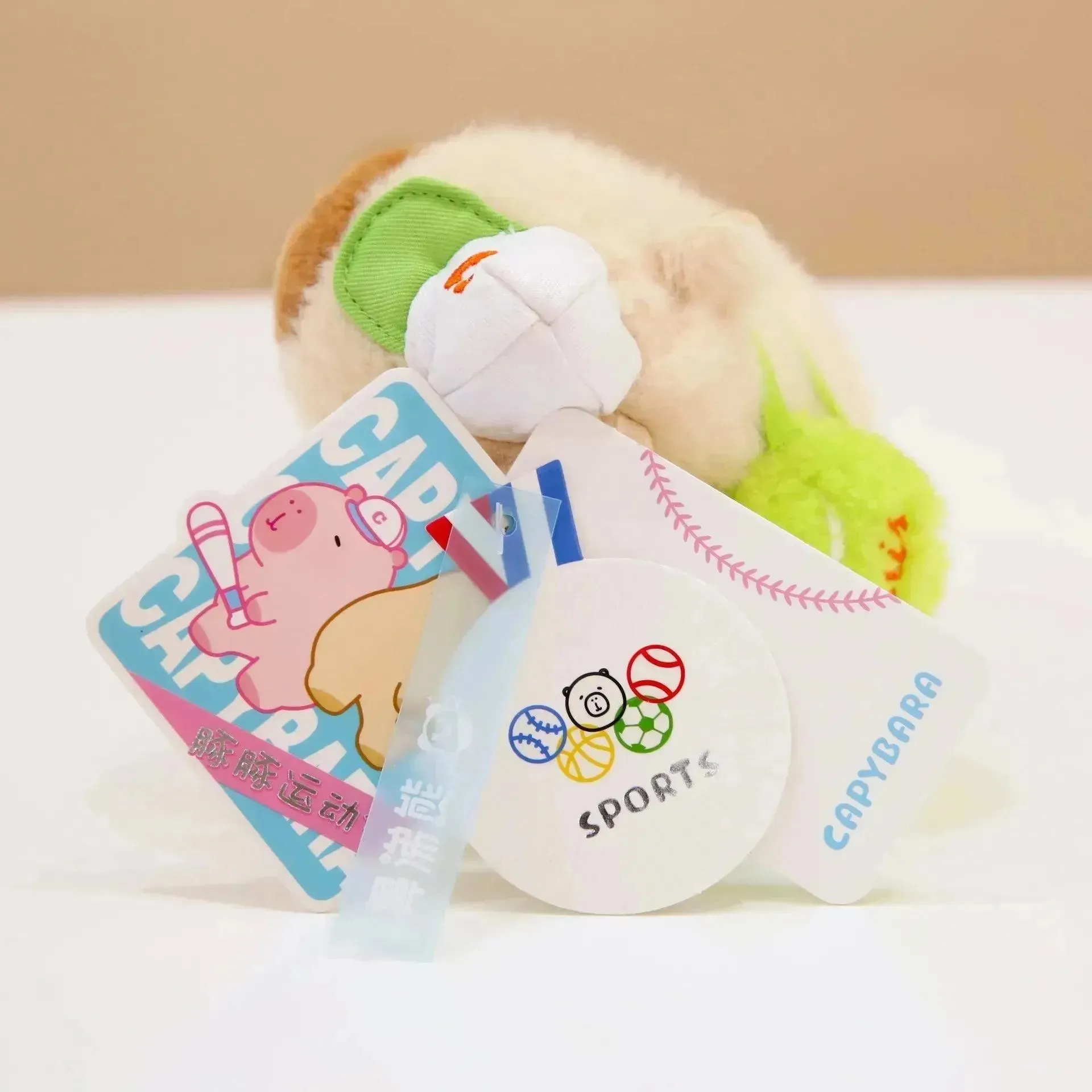Sporty Capybara Pull Ball Plush Keychain